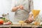 Chef prepares dough in a light kitchen with ingredients, culinary recipes, cooking bread, baking italian pasta.Restaurant and