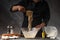 The chef prepares the dough for the preparation of confectionery. Working with the dough