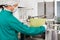 Chef Preparing Green Pasta Sheet In Machine