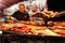 Chef preparing roasted meat at the Medieval Market