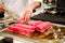 Chef preparing tuna steaks