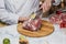 Chef puts lime in a vacuum bag with meat