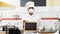 Chef in respirator with chalkboard at kitchen