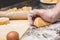 The chef& x27;s hands prepare dough for pasta