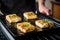 chef searing tofu steaks on a griddle