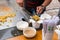 Chef Serving Stir Fried Noodles in Take Out Box