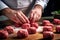 Chef shaping meatballs, a glimpse into culinary expertise and food preparation. food safety