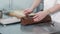 Chef sharpens a knife in the kitchen of the restaurant