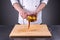 Chef slices and peels ripe mango in the restaurant kitchen7