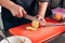 Chef slicing lemon at restaurant