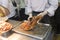 Chef slicing roasted Peking duck