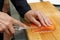 Chef is slicing salmon fillet