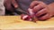 A chef slicing tuna fillet for sashimi producing.