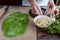Chef step by step, preparing a green ravioli