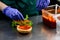 Chef in sterile gloves prepares a vegetarian burger