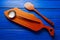 Chef tool wood spatula and table board on blue