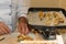 Chef with Uniform Preparing Pasta Filled with Cheese