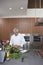 Chef Washing Leafy Vegetables In Commercial Kitchen