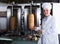 Chef wearing uniform standing on kitchen