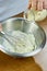 Chef whisk mayonnaise in a bowl in hand a series of full cooking food recipes