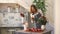 Chef woman preparing flowers, fruits and vegetables for cooking and making fruit bouquet