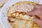 Chef at work: How to make a ham and cheese filling for traditional pancakes