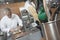 Chef Working With Utensil Holder In Foreground