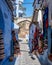 Chefchaouen the blue pearl in morocco, narrow street with typical shop