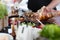 Cheff serving traditional meat dish on street stall on street food festival, Ljubljana, Slovenia.