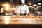 Chefs artistry in the kitchen, wood table defocused in the backdrop