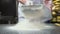 Chefs hands throws the flour through a sieve