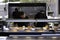 Chefs prepare burgers in an open-air kitchen at MONA Museum in Tasmania