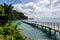 Chek Jawa Broadwalk Jetty, wooden platform in mangrove forest wetlands overlooking sea on Pulau Ubin Island, Singapore