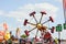 Cheltenham, United Kingdom. June 22, 2019 - colorful extreme speed timelapse spining on amusement park wheel roatating machine for