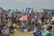 Cheltenham, United Kingdom - June 22, 2019 - Crowd of people in amusement park admiring diverse offers