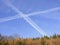 `Chem-trails` of planes crossing the sky