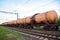 Chemical Cars on railway. Petroleum rail. The rolling stock with petrochemical tank cars. Transportation methanol tank wagons. Out