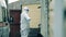 Chemical disinfection of a medical worker in a hazmat suit