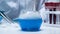 Chemical flask with blue boiling liquid standing on the table at laboratory