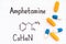 Chemical formula of Amphetamine with some pills