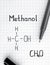 Chemical formula of Methanol with black pen