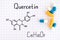 Chemical formula of Quercetin with some pills