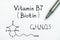 Chemical formula of Vitamin B7 Biotin with pen