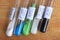 Chemical reagents in test tubes: nickel chloride, zinc sulfate, manganese sulfate, copper sulfate, iron oxide of black color.