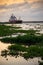 Chemical tanker docked in the Magdalena River at sunset. Colombia.