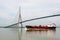 A chemical tanker sailing under the Normandy bridge in France