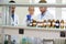 Chemical technicians perform experiment in lab