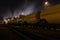 Chemical train in depot at night