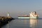 Chemical Vessel leaving the port in clear weather. Pier view