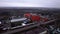 Chemicals manufacturing plant red building in field aerial